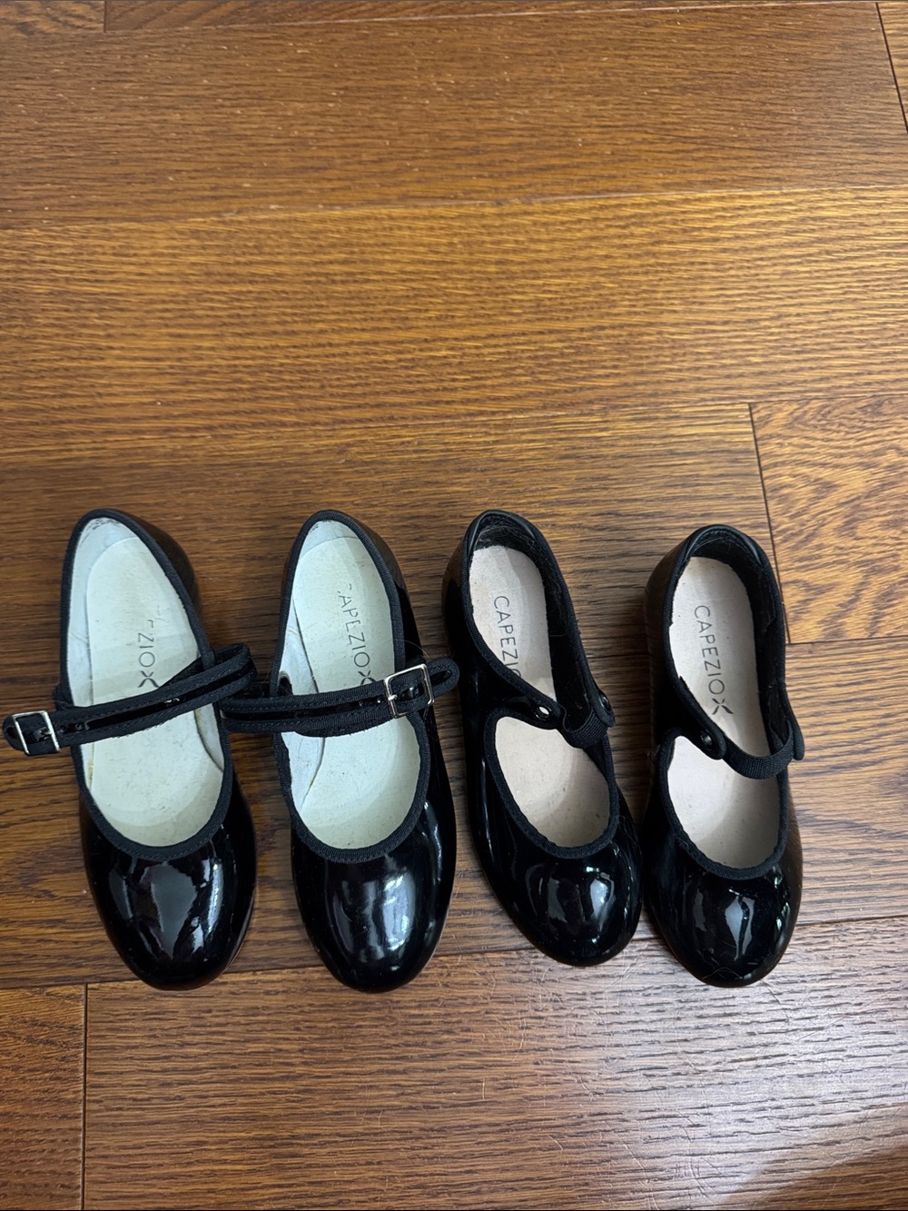 Two pairs of Capezio Girls Black tap shoes